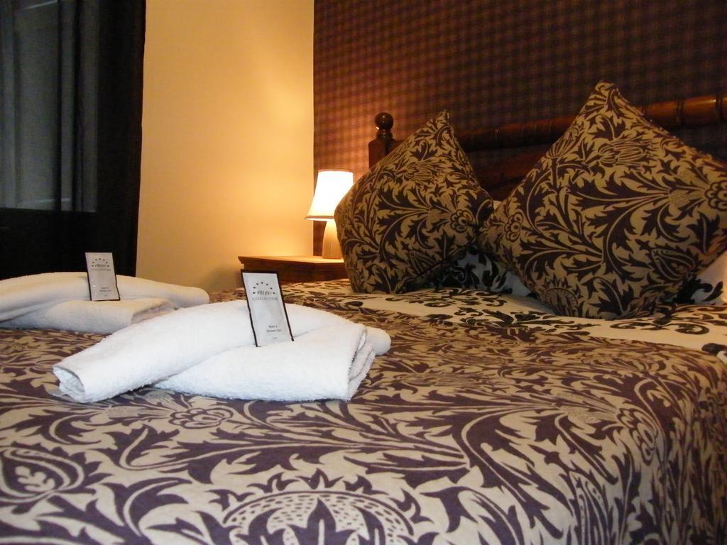 Royal Mile Group Apartments Эдинбург Номер фото