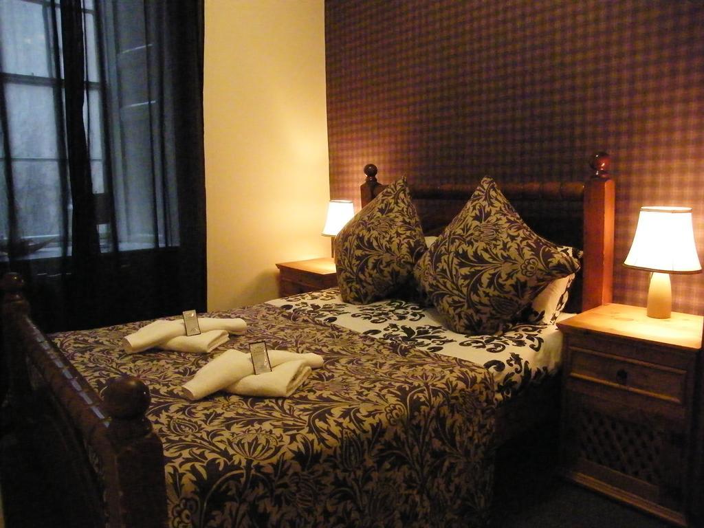 Royal Mile Group Apartments Эдинбург Номер фото
